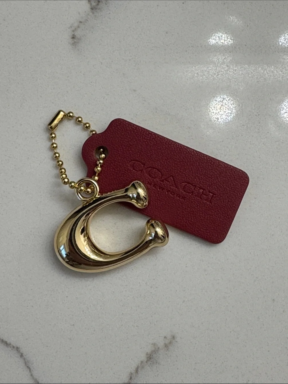 Coach Gold 'C' Charm with Burgundy Leather Tag